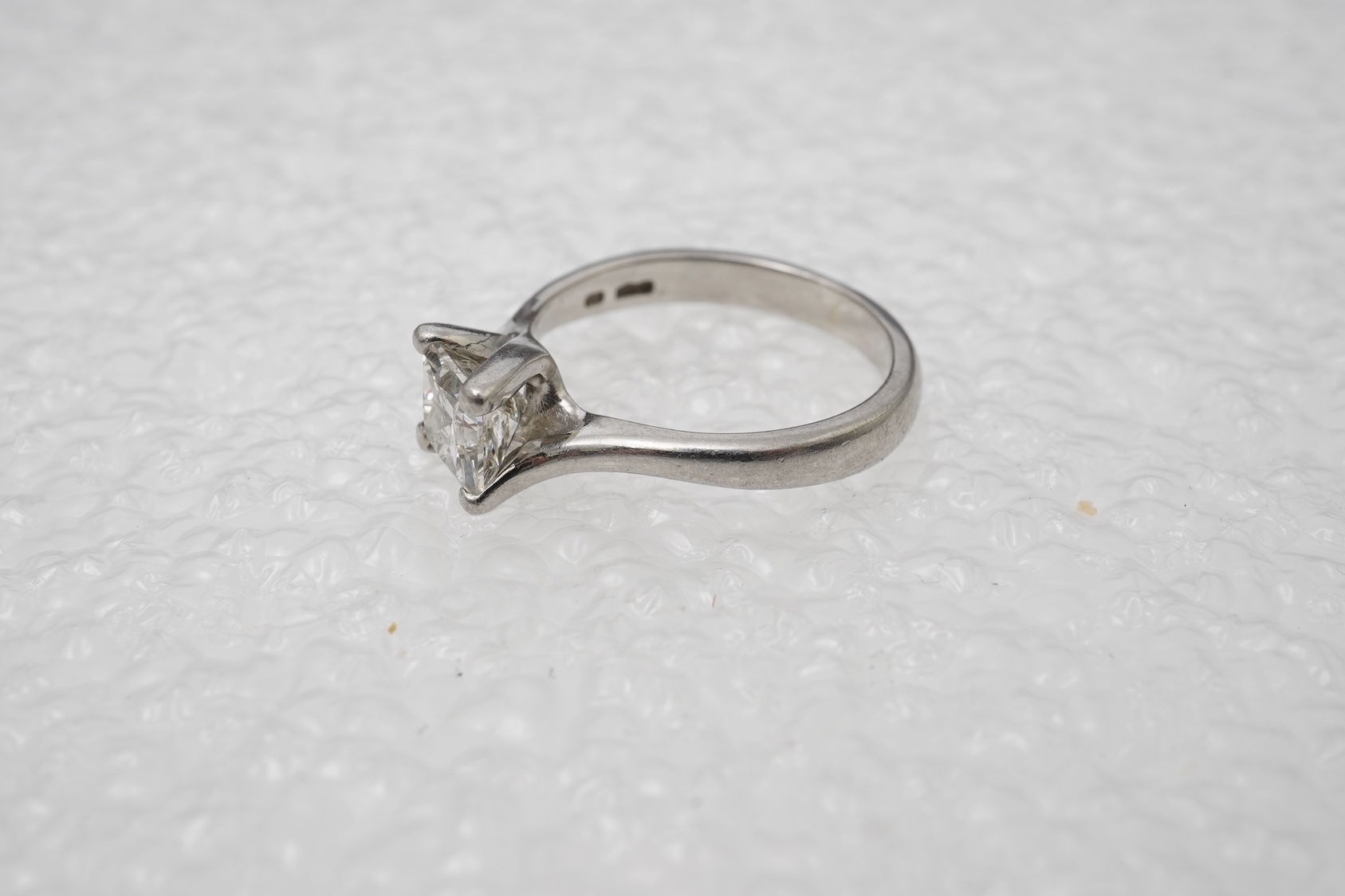 A diamond solitaire ring